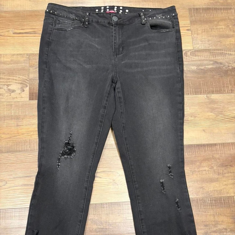 Black studded low rise flare jeans with a unique design Alt skater thrashed